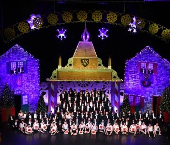 The UNI glee club on stage during their winter performance.